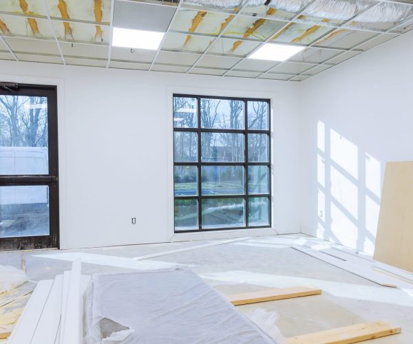 Making renovation of office hung of suspended ceilings Making renovation of hung of suspended ceilings lights high in a bright modern office